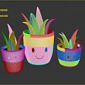 Green Plants in Smiley Face Pink and White Pots of Different Sizes