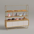 Gold Metal Pastry Display Shelf With Various Cakes Pastries And Wooden Cabinet