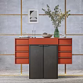 Orange Sideboard with Drawers Featuring Vase Plants Gray Wall Gold Lines and Wall Art