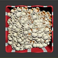 Red And White Striped Popcorn Bucket Filled With Fresh Popcorn Perfect For Movie Nights