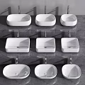 White Ceramic Washbasins In Different Shapes On Gray Countertop With Chrome Faucets For Modern Bathroom