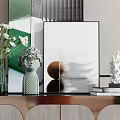 Modern Entryway Console Cabinet With Wooden Body Gold Trim Green Plants And Framed Art Decor