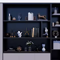 Interior Decorative Ornament Set On Dark Bookshelf With Sculptures Vases Books And Starfish