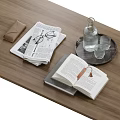 Decorative Ornament Combination With Books Eyeglasses Newspaper Tray Glass Bottle And Cups On Wooden Table