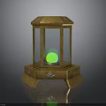 Ornate Golden Lantern Shaped Display Case With Green Orb And Decorative Base