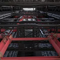 Industrial Equipment Structure With Red Pipes And Metal Frame Components
