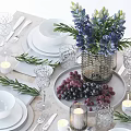 Complete Tableware Set With Bowls Plates Cutlery Wine Glasses Candles And Floral Decor