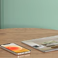 Smartphone With Orange Screen And Tablet Showing Home Interior On Wooden Table