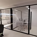 Modern Conference Room With Large Wooden Table Black Office Chairs And Glass Windows