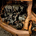 Rusted Damaged Van With Burnt Body And Broken Metal Parts