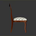 Elegant Wooden Stool With Carved Backrest And Floral Patterned Upholstered Seat