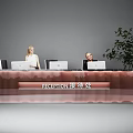 Interior View Of Modern Reception Desk With Receptionists Computers And Green Plant