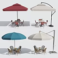 Outdoor Table Set With Red White Blue Umbrellas And Matching Chairs