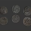 Ancient Metal Coins Featuring Sculpted Portraits And Detailed Historical Engravings