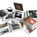 Open Books and Magazines Showcasing Varied Scenic Photos Interior Designs and Artwork