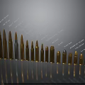 Assorted Caliber Bullets Arranged By Size As Weapon Ammunition