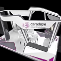 Sanatem Modern Exhibition Booth Design With Medical Display Seating And Purple Accents