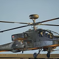 Military Attack Helicopter With Rotors Cockpit Weapon Systems Landing Gear And Camouflage Paint