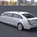 White Cadillac Luxury Limousine Featuring Extended Body And Modern Front Grille Design