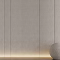 Light Colored Textured Modern Wall Paneling With Vertical Slats Underlighting And Decorative Sphere