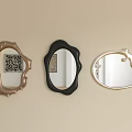 Three Decorative Mirrors with Different Shapes and Colors Mounted on Beige Wall 3d model