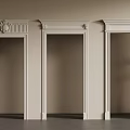 White Decorative Door Frames With Beige Wall And Green Plant Accents