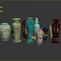 Various Hand Carved Vases With Intricate Sculpted Patterns And Colors