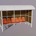 Bus Stop With Worn White Roof Brown Panels And Orange Seats