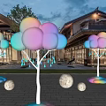 Illuminated Cloud Art Installation With Colorful Base Raindrop Ornaments And Moon Balls In Outdoor Night