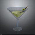 Elegant Martini Glassware With Frosted Rim And Green Olive Garnish On Dark Background