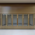 Golden Entrance Gate with Multiple Glass Doors and Decorative Frames