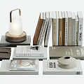 Stacked Books And Magazines With Different Cover Styles And Decorative Table Lamp
