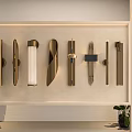 Modern Wall Lamps Various Styles with Brass Finishes Displayed on Shelf