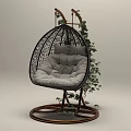 Stylish Rattan Hanging Chair With Gray Padded Cushion Wooden Stand And Green Vines