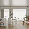 Modern Open Kitchen Dining Area With White Cabinets Island Counter Pendant Lights And Wooden Flooring