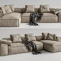 Modern Beige Sectional Sofa With Plush Cushions And Soft Throw Blanket 3d model