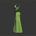 Man Wearing Green Dress with Structured Tailoring and Floral Decorations