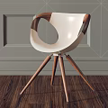 Modern White Accent Chair With Wooden Arms And Legs On Gray Wall Wooden Floor