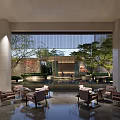 Modern Building Courtyard Pergola With Water Feature Greenery And Seating Area