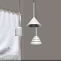 Modern Pendant Lights In Different Shapes Hanging By Window With Light Colored Wall 3d model
