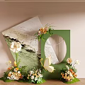 Art Installation Featuring Green Square Structure Circular Mirror Rock Texture Floral And Butterfly Accents