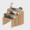 Wooden Reception Desk With Layered Design And Decorative Items Including Vase Fan And Books