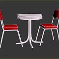 Elegant Round Silver Table And Two Red Chairs With Metal Frame In Reflective Surface