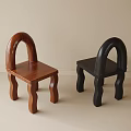 Modern Arched Backrest Brown And Black Single Accent Chairs With Curved Legs In Minimalist Room
