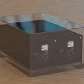 Transparent Glass Top Square Coffee Table With Headphone Speaker Devices On Wooden Floor