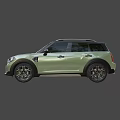 Stylish Green Mini SUV With Black Stripes Black Roof And Alloy Wheels Design