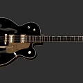 Black Hollow Body Electric Guitar Featuring Gold Accents And Musical Instrument Details