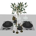 Elegant Tableware Set with Black Plates Bowls Golden Candle Holders Green Plants and White Placemats