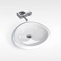Modern White Oval Shaped Ceramic Washbasin With Black Faucet Design