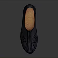 Black Leather Slip On Shoes With Swirl Pattern Stitching And Orange Lining